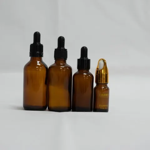 Poteli gwydr personol ar gyfer olewau hanfodol, amrywiol arddulliau a lliwiau